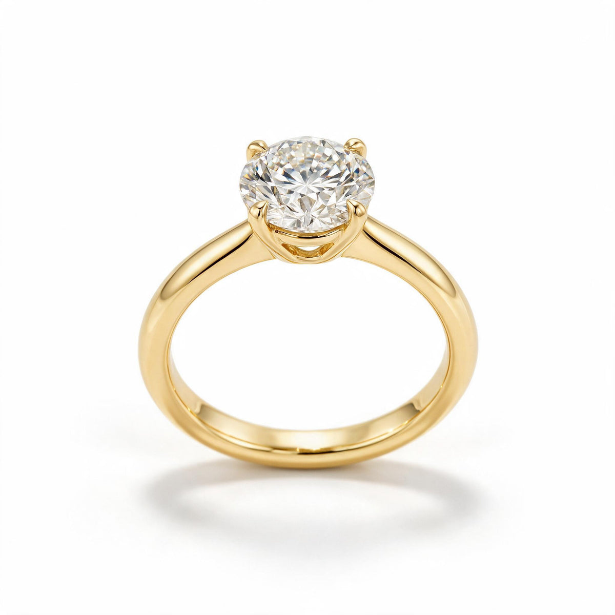 Round-cut diamond solitaire engagement ring in 14k gold